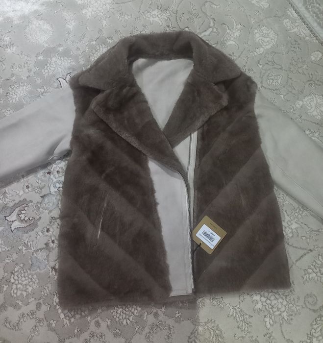 Продам дублёнку новую