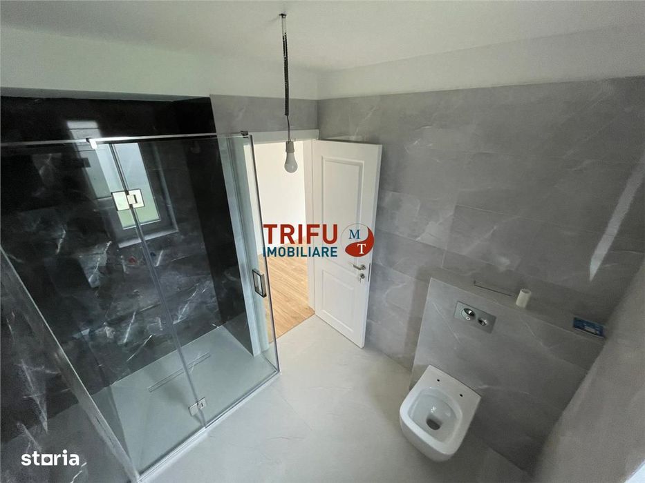 Casă pe un nivel cu garaj zona Centru