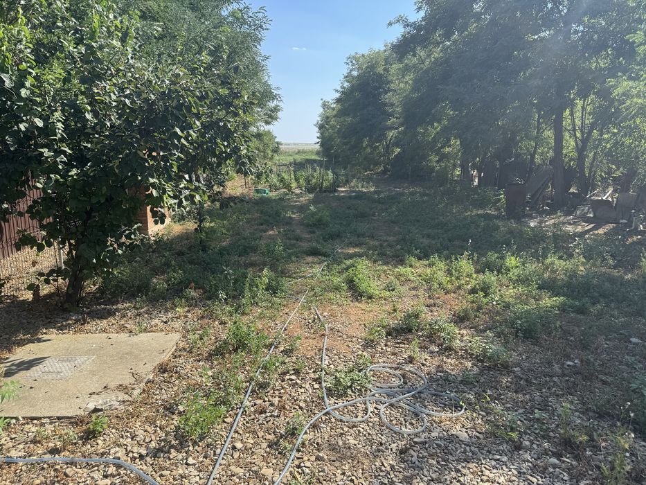 Vand sau schimb casa cu teren si iesire la lac cu ponton