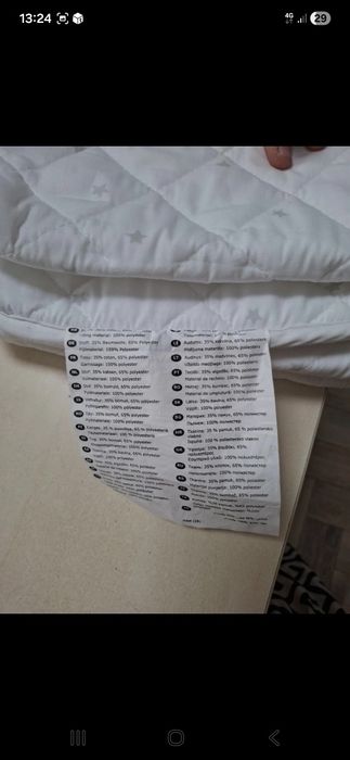 Cearceaf cu apărători la pătuț..