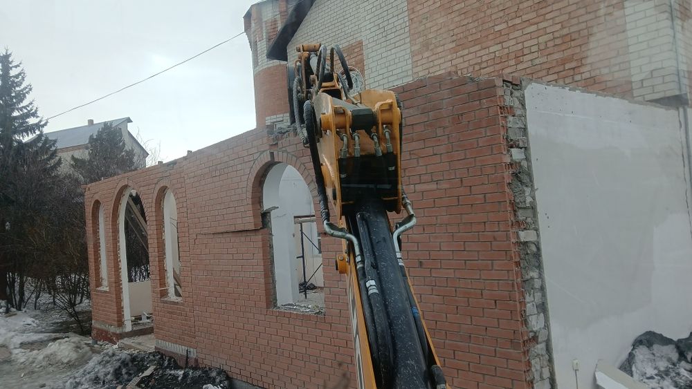 Услуги экскаватора погрузчика