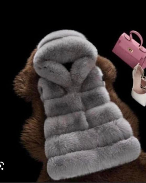 Дамски пухен елек