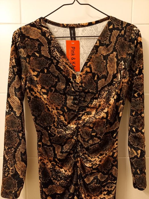 Rochie mini pe corp cu print pantera. Esti indrazneata sa porti rochia