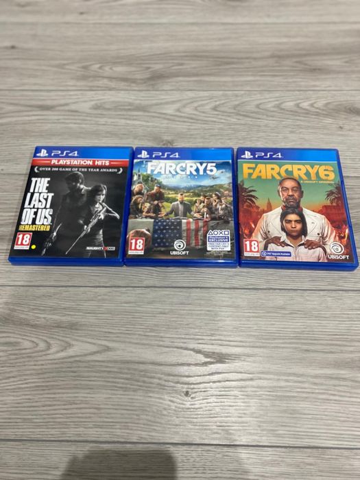 Consolă Playstation 4 Fat, negru mat + 2 manete + 3 jocuri PS4