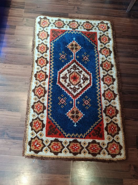 Вълнено килимчее
