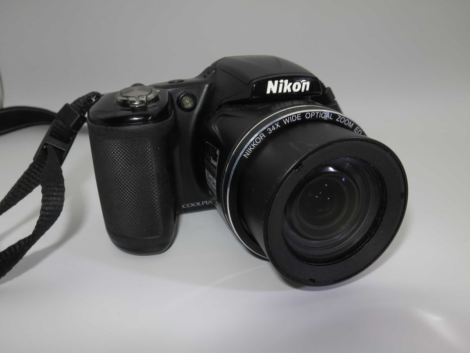 Nikon Coolpix L830 компактен цифров фотоапарат с огромен 34х оптичен зуум, дигитална камера Full-HD видео клип, и флип екран, като НОВА, рабои отлично