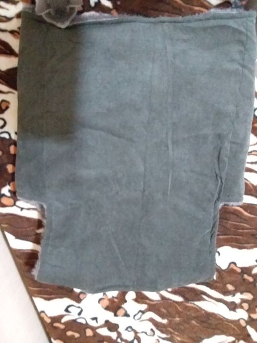 Новая ,теплая безрукавка ,за 100000