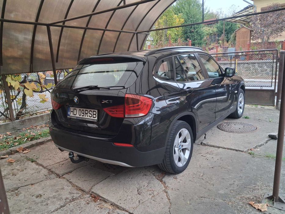 BMW X1 2011 — imagine 8