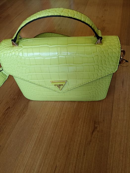 Продавам  оригинална на 1000 процента стилна нова чанта на Guess