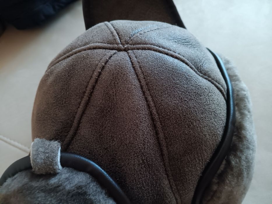 Кожена зимна шапка ушанка. шапка плетена