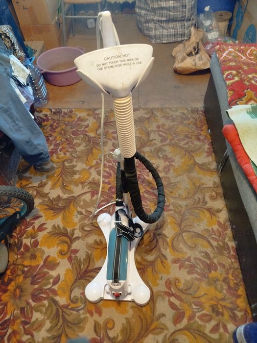 Отпариватель электрический рабочий.