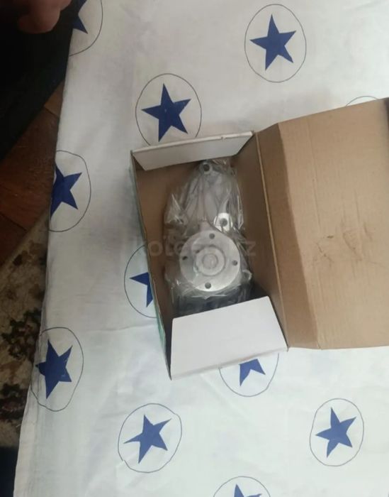 Помпа Mazda Cronos