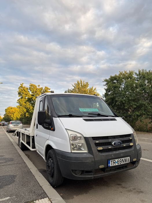 Vând Autoplatformă Ford Transit 2.4 90 CP – Punte dublă, Perne de aer, Cârlig 2.3t – Gata de lucru!