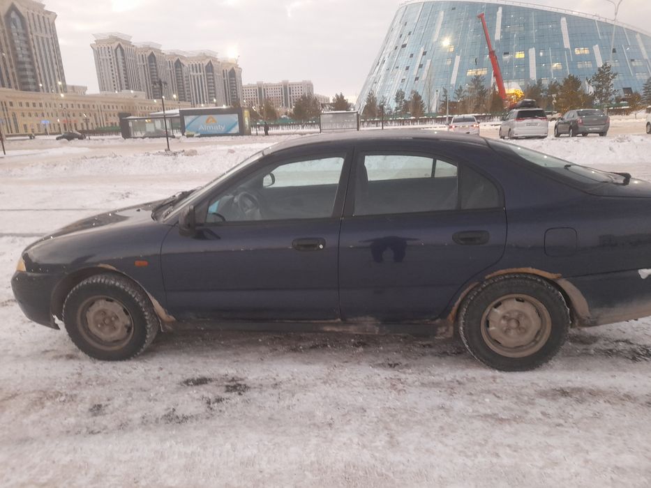 Мицубиси Каризма