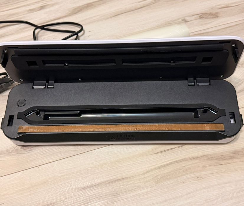 Вакуумный упаковщик