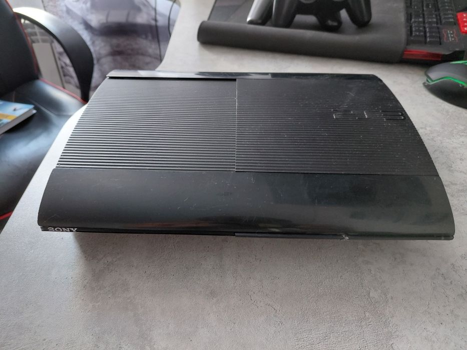 PlayStation 3 Super Slim [500 ГБ] + 2 геймпада + Игры