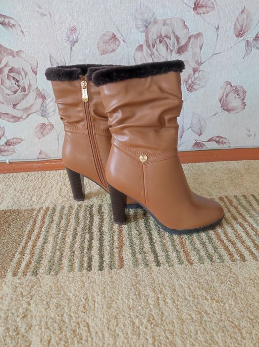 Продам зимние сапоги