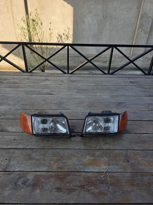 Передние фары с Корректором на Ауди S4 100 С4 кузов. Original Hella.