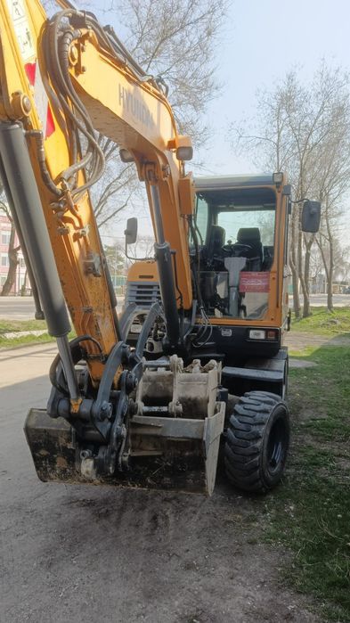 Услуги колёсный экскаватор 140