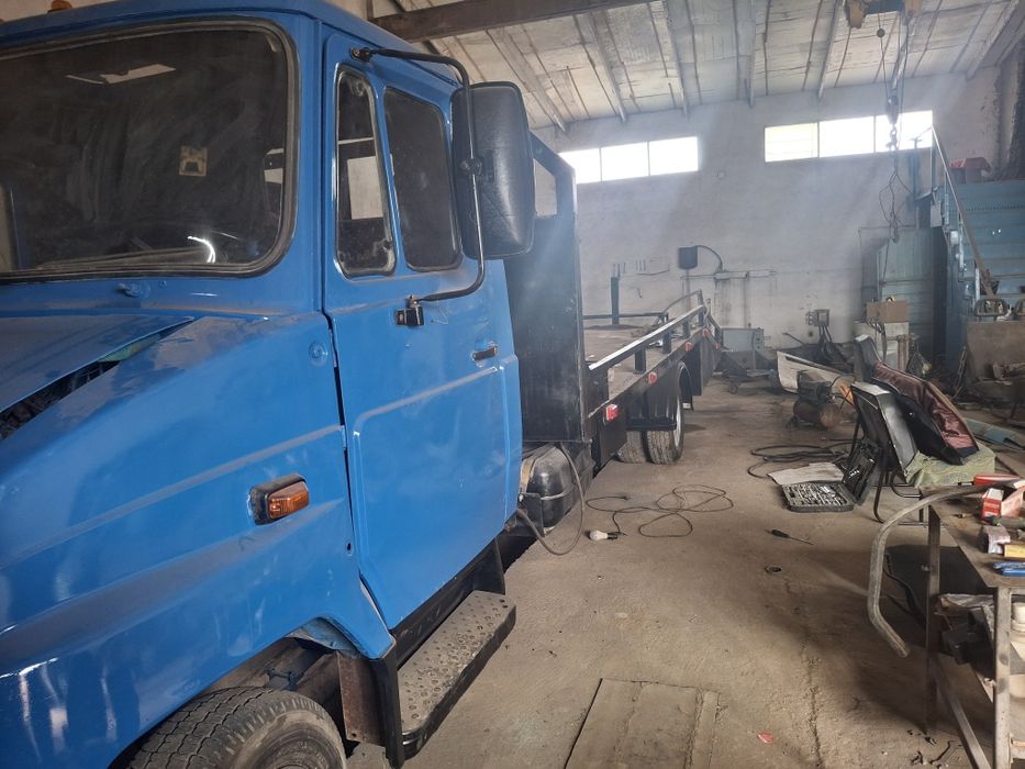 Манипулятор эвакуатор зил бычок