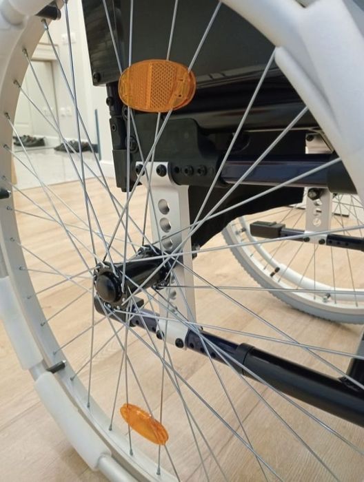 Качественная инвалидная коляска.