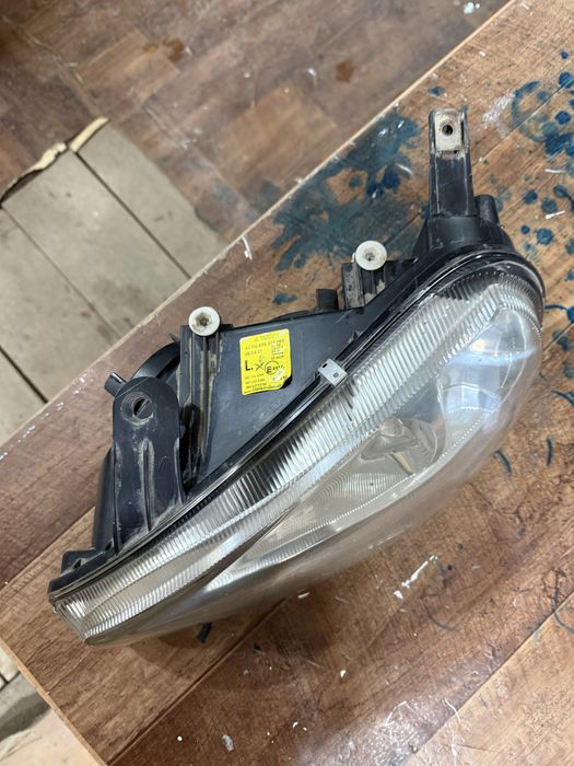 Фара калина 1 левая стекло оригинал бош