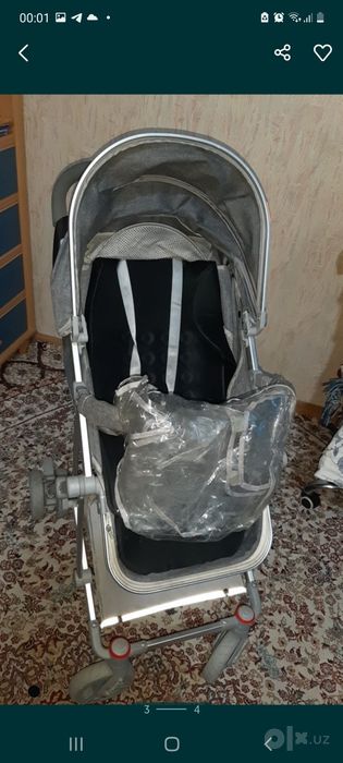 Продам коляску лёгкую и дождевик