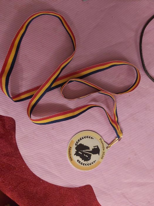 Medalie oficială a Universității „Titu Maiorescu” din București (UTM)