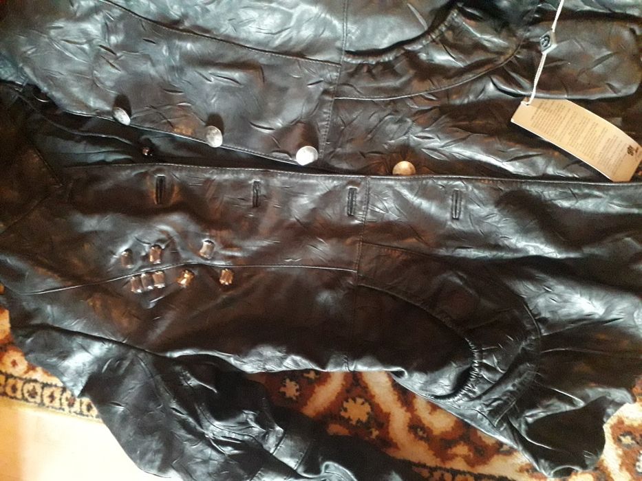 Новая кожаная куртка