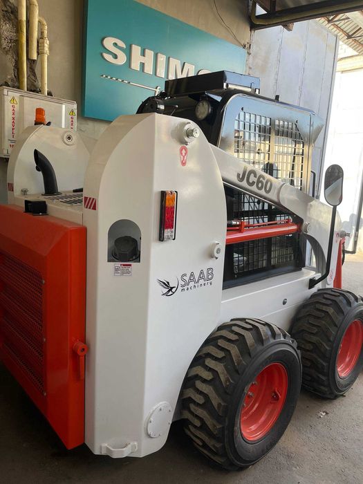Погрузчик с бортовым поворотом Мини погрузчик  BOBCAT