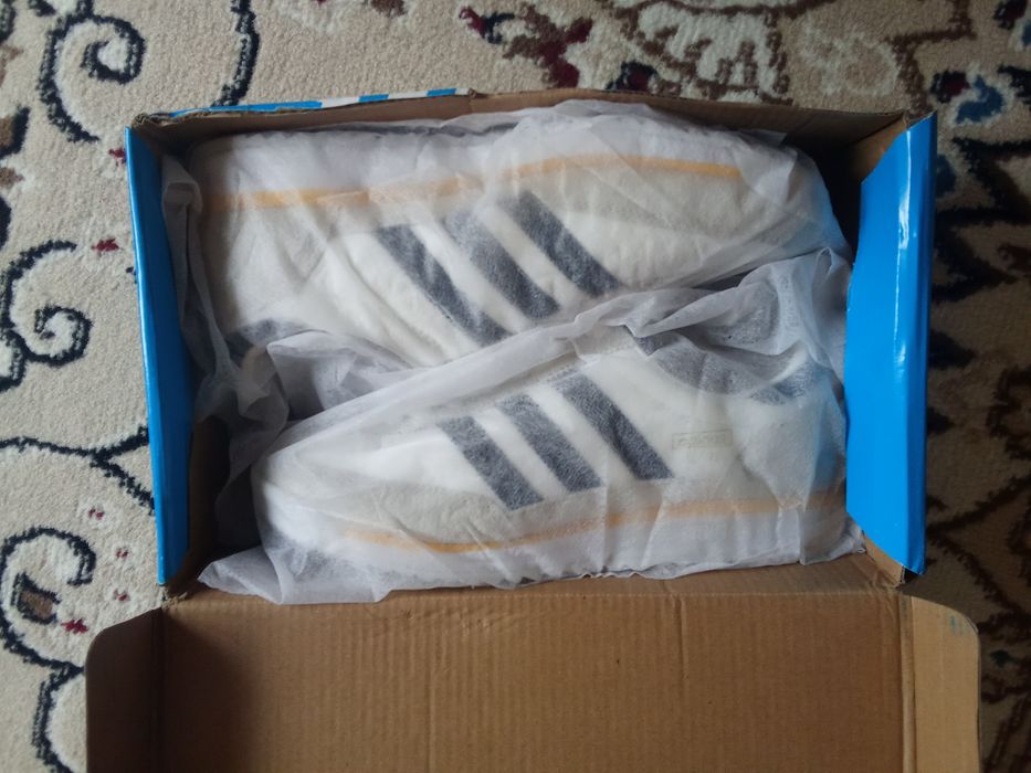 Новый кроссовки купил в России