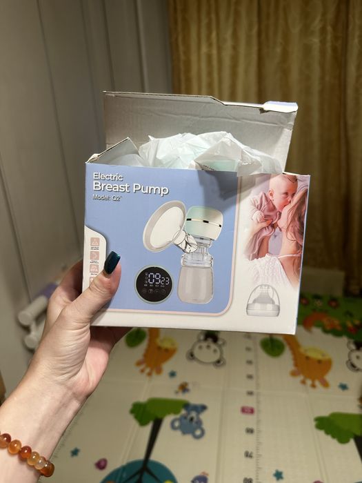 Молокоотсос для грудного молока