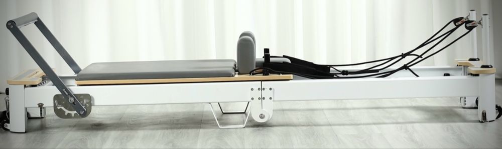 Aparat pilates reformer pliabil din aluminiu complet accesorizat