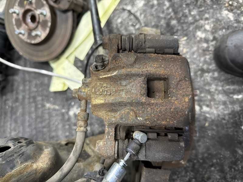 Суппорт задний на Hyundai Santa Fe (SM)