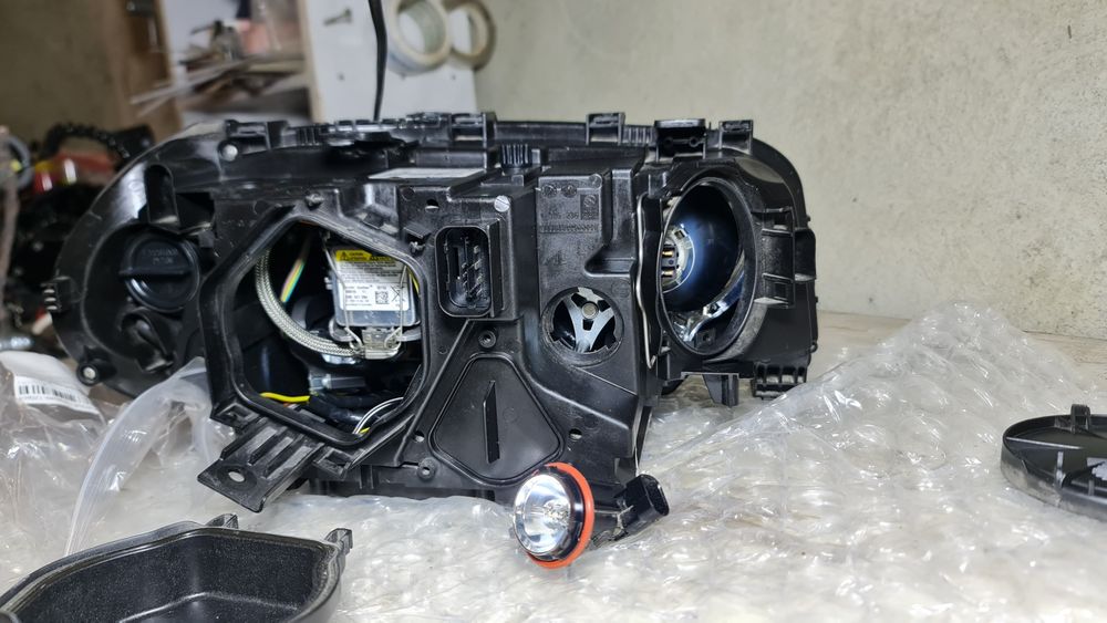 BMW е83 x3 ляв фар биксенон завиващ