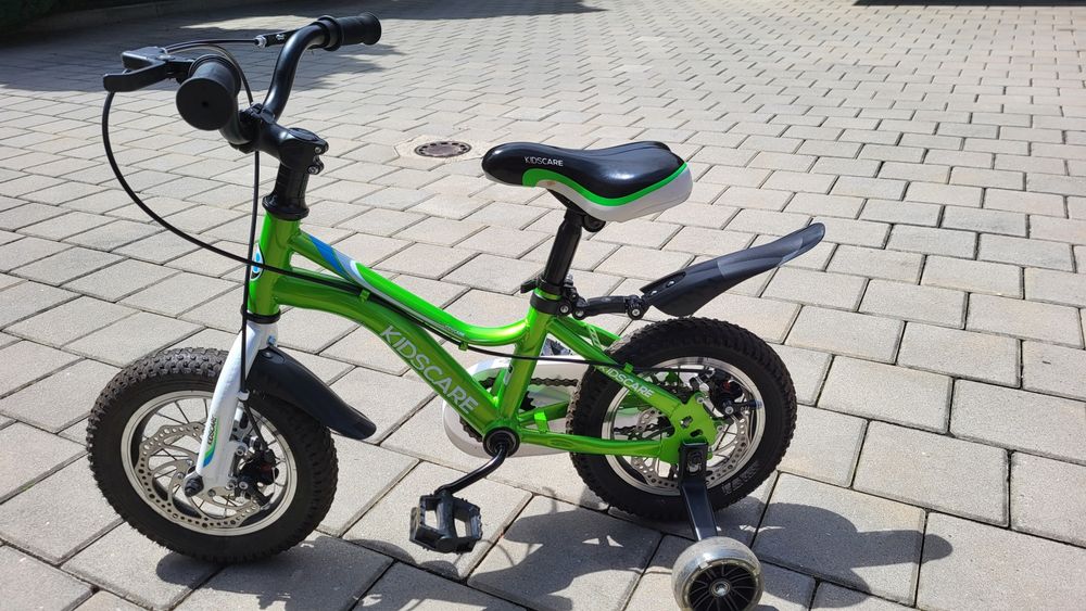 Bicicleta  copii 2-4 aniKidsCare,12 inch
Bicicleta pentru copii 2-4 ani HappyCycles KidsCare, roti 12 inch, cu roti ajutatoare si frane pe disc, verde