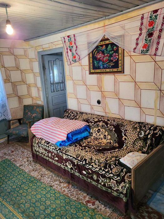 Casă caramida Radoiesti cu teren de 1.138 mp și deschidere la două străzi – 50.000 lei negociabil