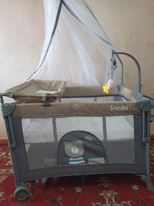 ПРОДАМ СРОЧНО и не дорого манеж-кровать в идеальном состоянии