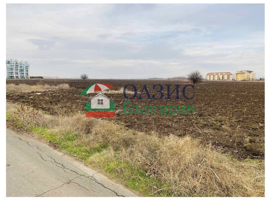 Парцел в статут на земеделски, на първа линия на морето, с. Ахелой,