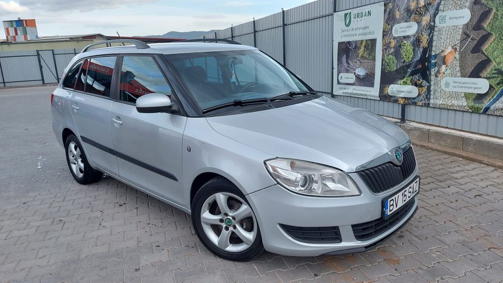 Skoda Fabia 1.6TDI-2012-EDITIE FAMILY-Senzori parcare-Climatronic etc.