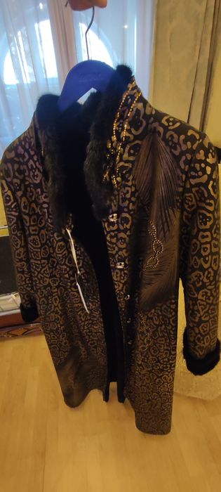 Норкавая дубленка женская