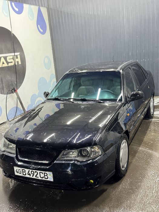Nexia 2 1.6 mator rangi qora 2009 yil..