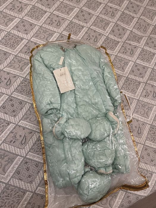 Продам детские комбинезоны