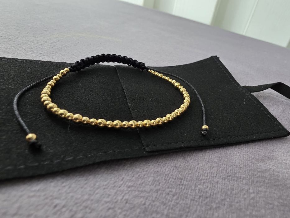Brățăra cu aur filat , șnur reglabil, 17 bile de aur filat 3 mm, 27 bile de aur filat 2,5mm, 8 buc 2 mm