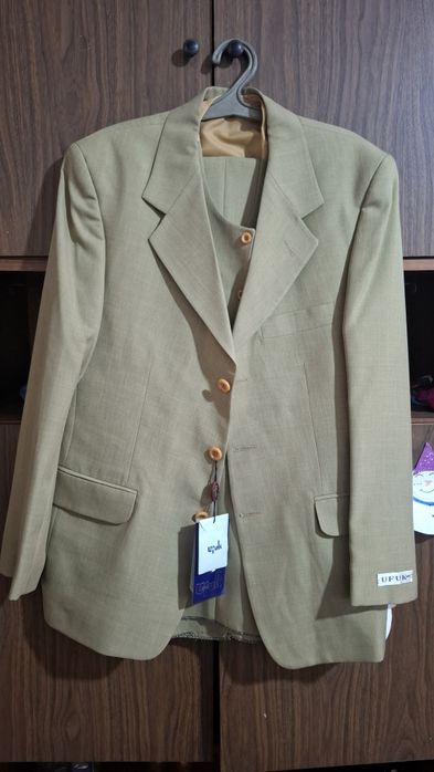 Мужские и женские одежды б/у