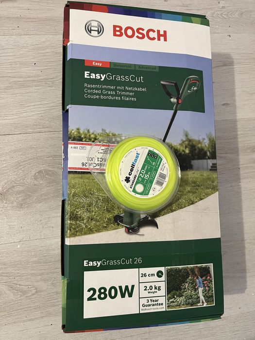 Vand trimmer taiat gazon