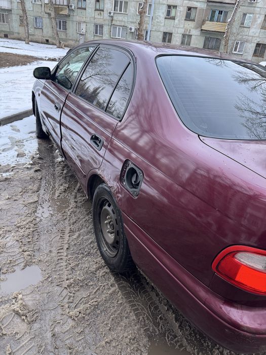 Продам машину Тойота Карина Е