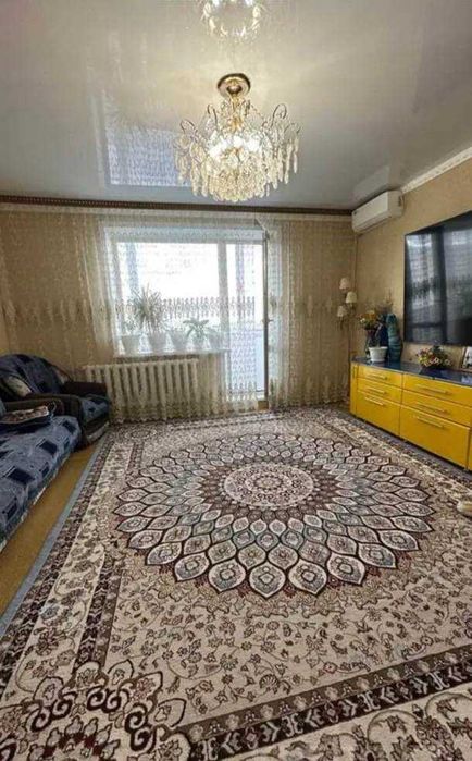 Продается 4-комнатная квартира