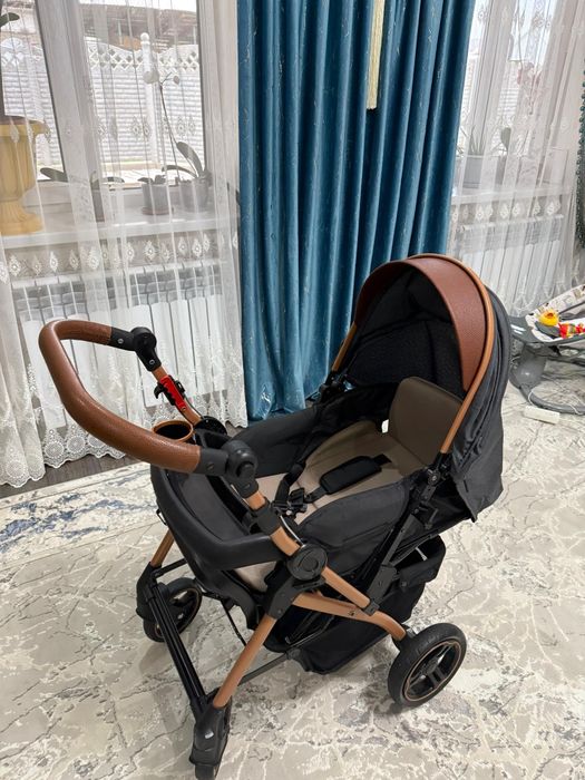 Детская прогулочная коляска