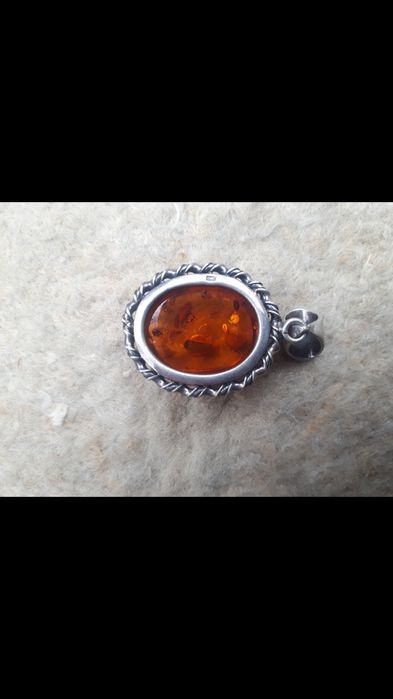 Серебряный кулон.